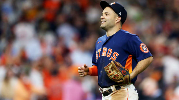 Jose Altuve runs off the field